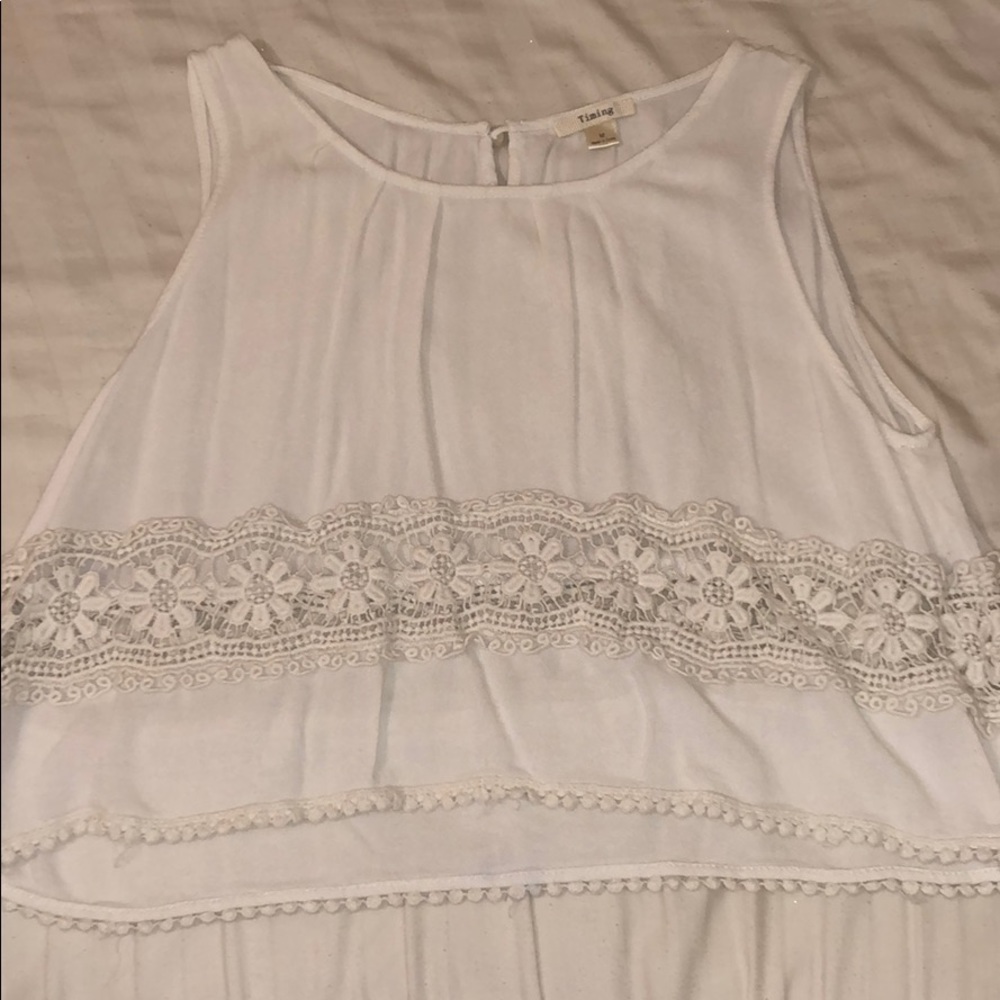 White flowy crop top with lace design